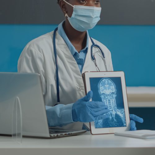 Doctor showing an X-ray scan on a tablet